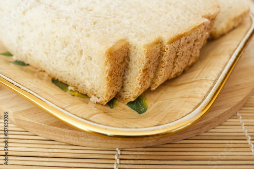 Pieces of white bread on a plate