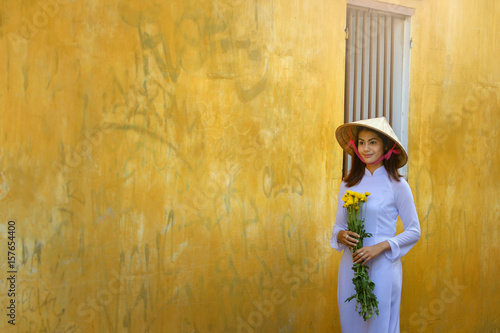 Beautiful woman with Vietnam culture traditional dress,traditional costume ,vintage style,Vietnam