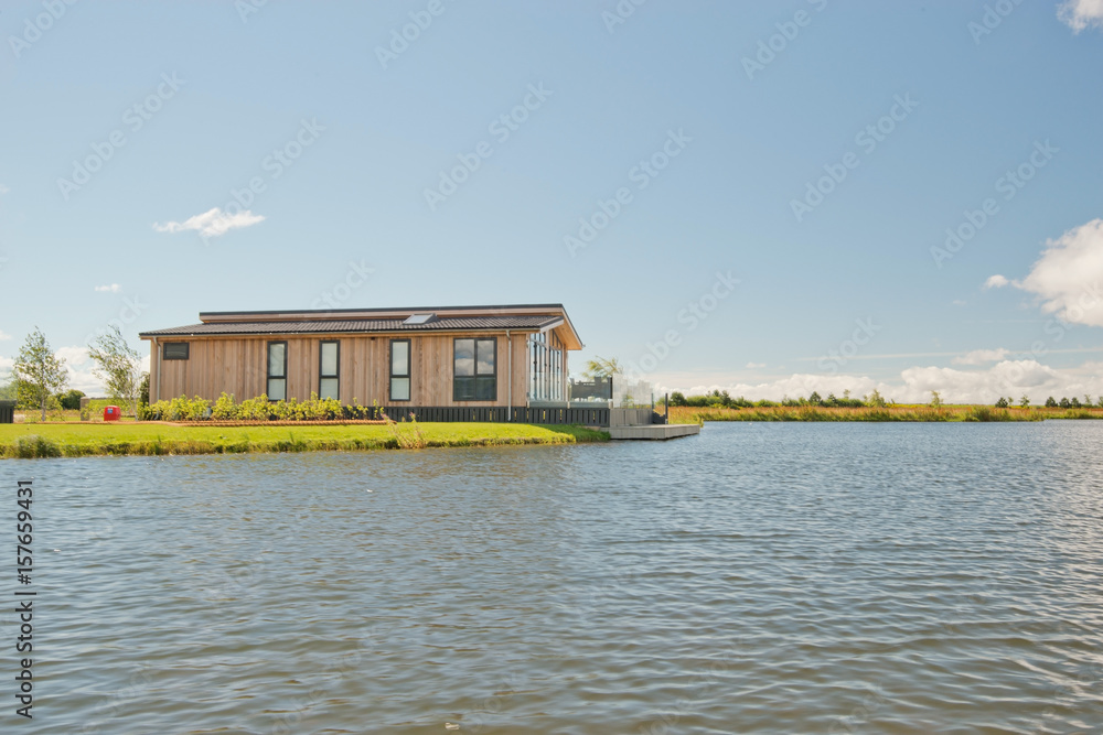 wooden house by the like wooden house by the like