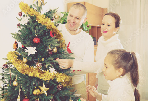 family preparing for Christmas