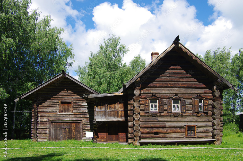 KOSTROMA, RUSSIA - July, 2016: Old wooden houses - monument of ancient Russian architecture KOSTROMA, RUSSIA - July, 2016: Old wooden houses - monument of ancient Russian architecture