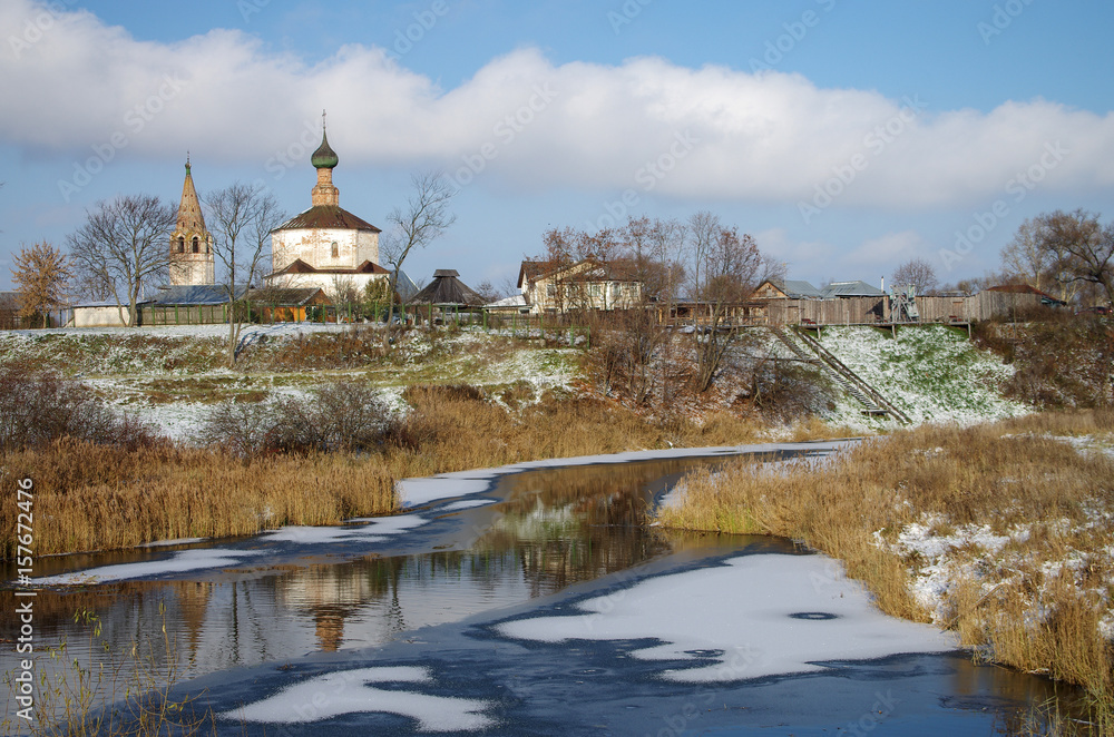 SUZDAL, RUSSIA - November, 2016: View of the old church in Suzdal. The Holy Cross Church and the Church of Cosmas and Damian SUZDAL, RUSSIA - November, 2016: View of the old church in Suzdal. The Holy Cross Church and the Church of Cosmas and Damian