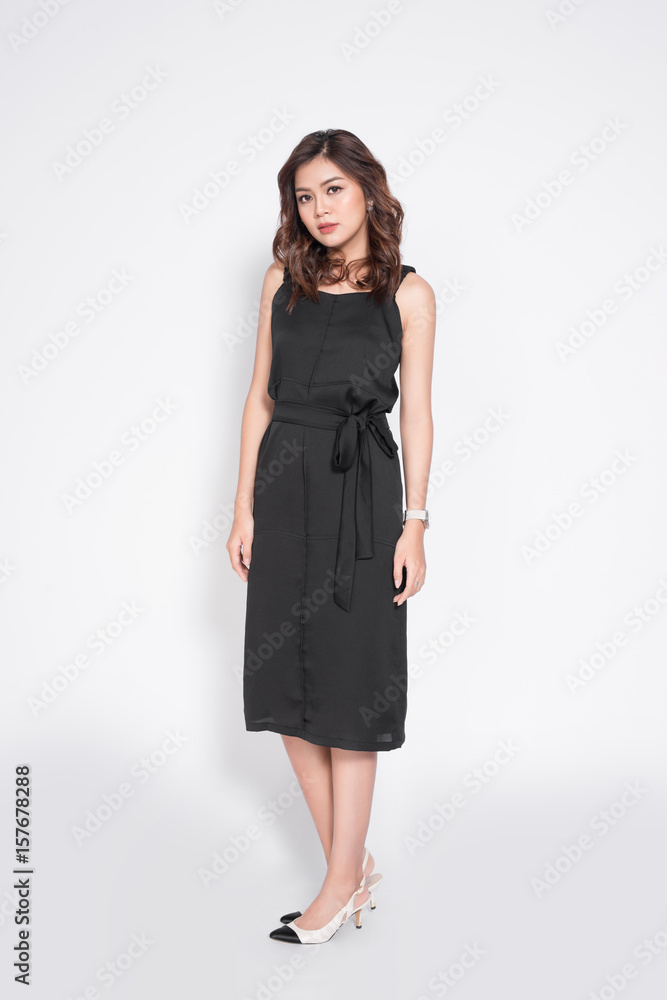 Beautiful stylish asian woman in elegant casual black outfit posing Beautiful stylish asian woman in elegant casual black outfit posing