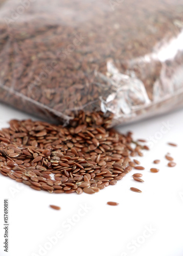 flax seeds on white background © bellakadife