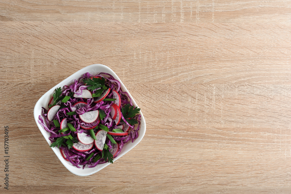 vegetarian menu - salad of cabbage and radish in the bowl vegetarian menu - salad of cabbage and radish in the bowl