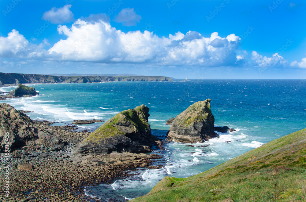 Porth-cadjack Cove near Portreath, Cornwall. In the distance, The North Cliffs extend to Godrevy Island and lighthouse.