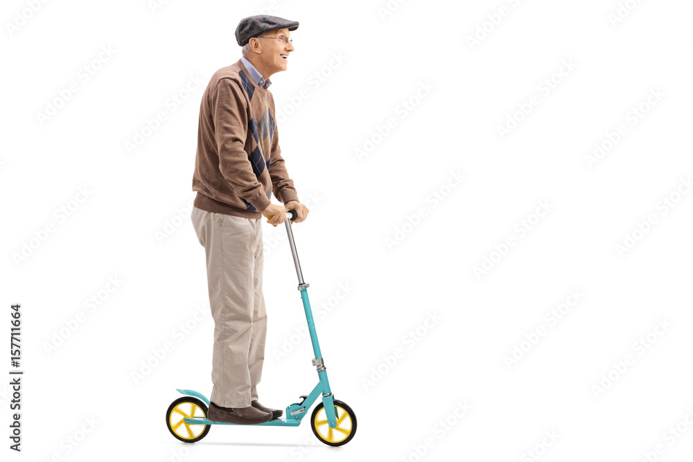 Fototapeta premium Senior riding a scooter