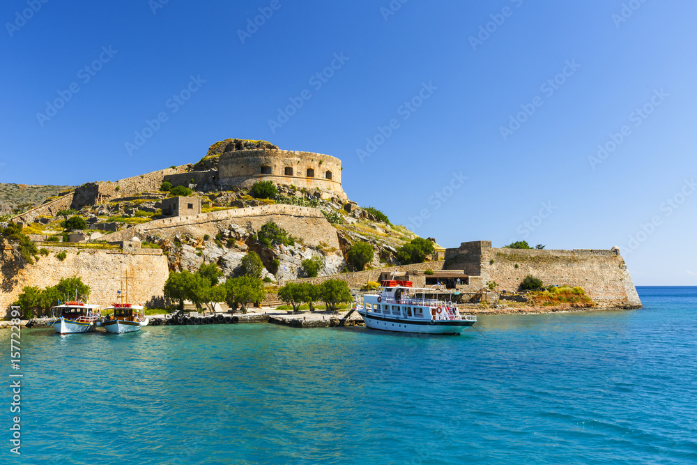 Historical site of Spinalonga island on a sunny spring day, Crete, Greece. 
