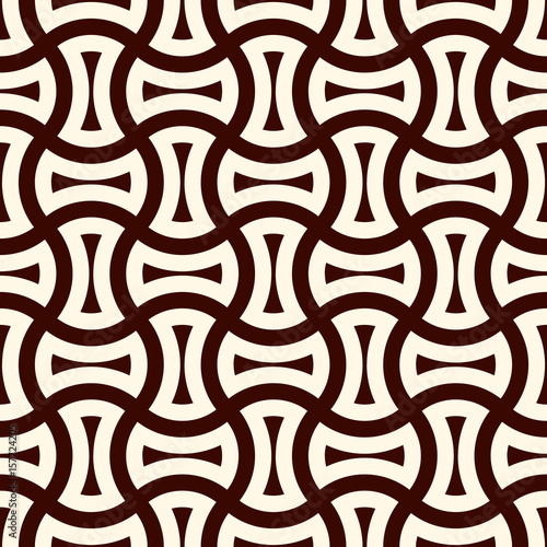 Apple core quilts texture. Bow tie motif. Seamless surface pattern design with interlocking axehead figures.
