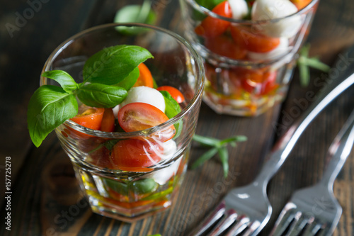 Small caprese salad in a glass