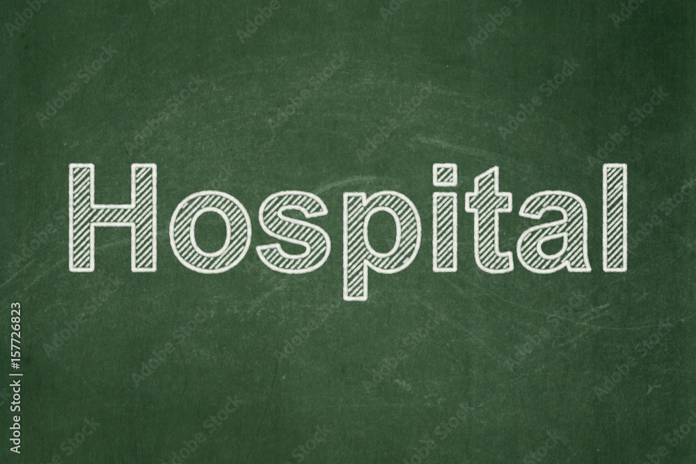 Fototapeta premium Healthcare concept: Hospital on chalkboard background