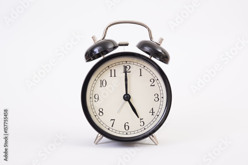 Vintage clock on white background