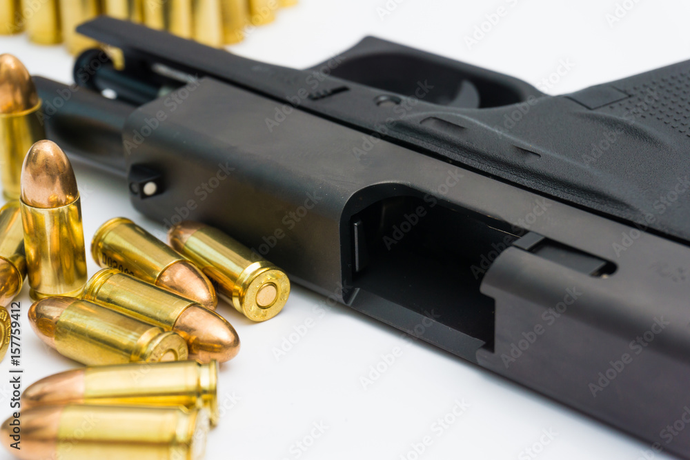 Black polymer 9mm Pistol and Full Metal Jacket Bullets