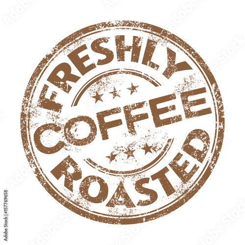 Brown grunge rubber stamp with the text freshly roasted coffee written inside the stamp