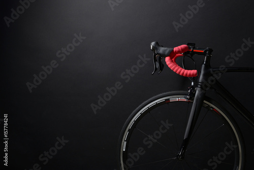 front and wheel of black race road bike