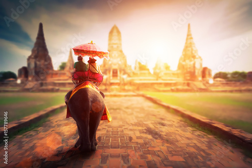 Tourists on an elephant ride tour of the ancient city Ayutaya ,thailand photo