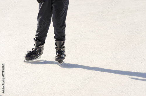 Ice skates on ring, people, winter sport and leisure concept