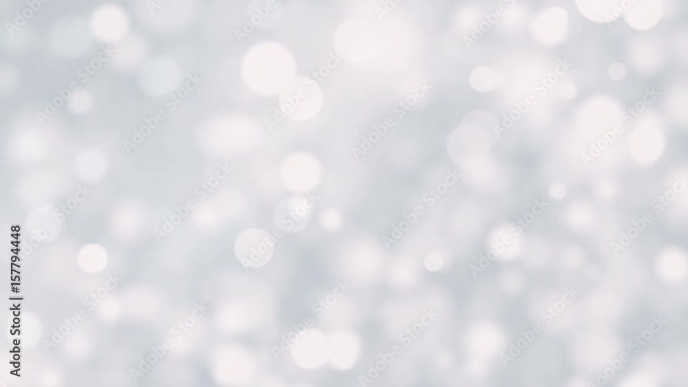 Abstract background with white bokeh lights and particles. Seamless loop Abstract background with white bokeh lights and particles. Seamless loop