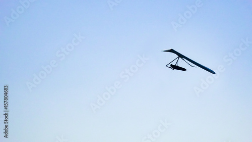 Hang Glider at clear blue sky