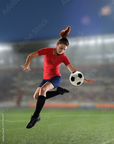 Young woman playing soccer