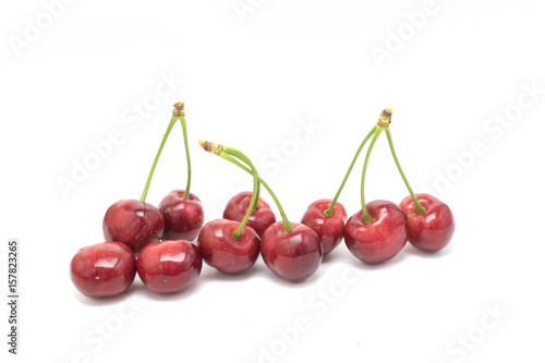  Sweet cherries isolated on white background © rastkobelic