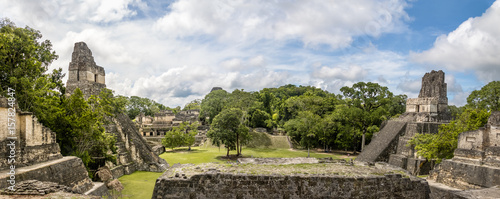 Panoramic view of Mayan Temples of Gran Plaza or Plaza Mayor at Tikal National Park - Guatemala