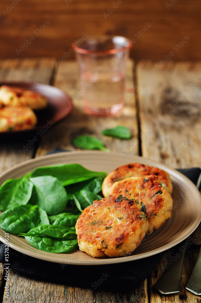 Salmon fritters with spinach