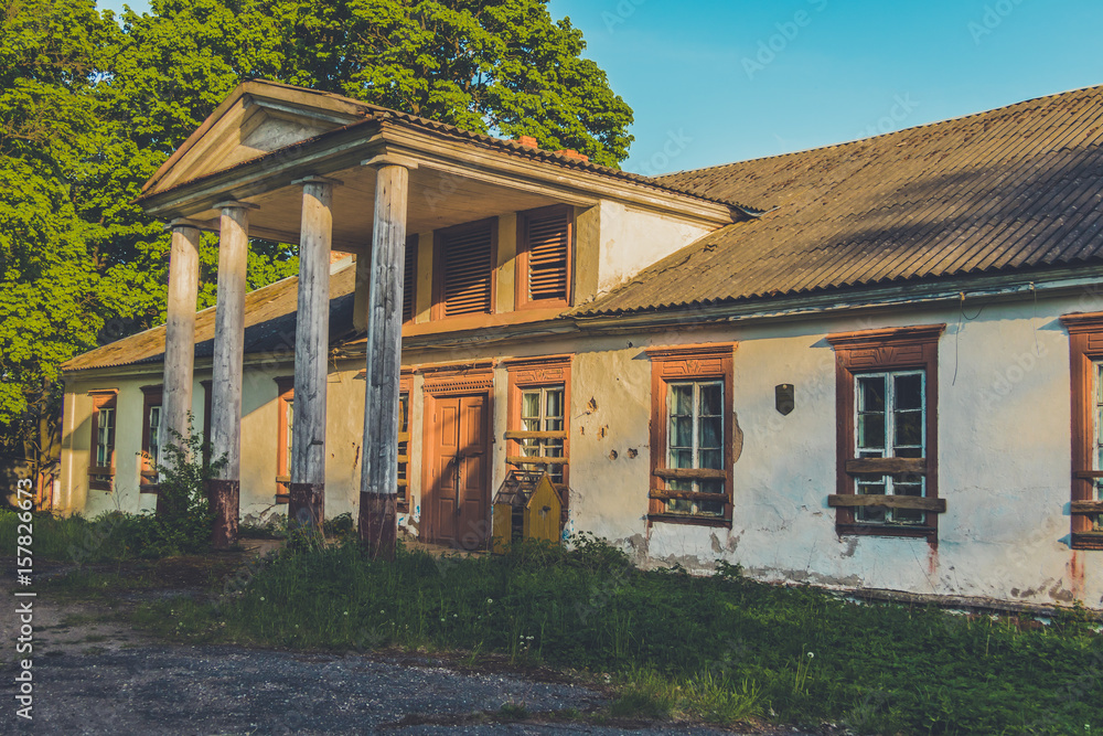 Old administrative house in Polish style in the village of Vidzy, Vitebsk region