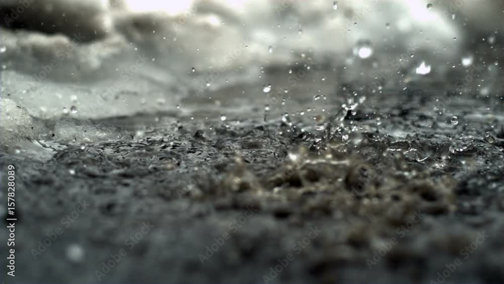Snow melting drops in super slow motion