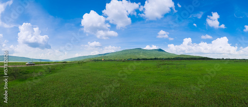 Green grass Field Meadow with Mountain of Khao Yai Thiang