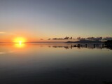 Beautiful sunset at the beach of Punaauia with a beautiful view on Moorea, Tahiti, French Polynesia