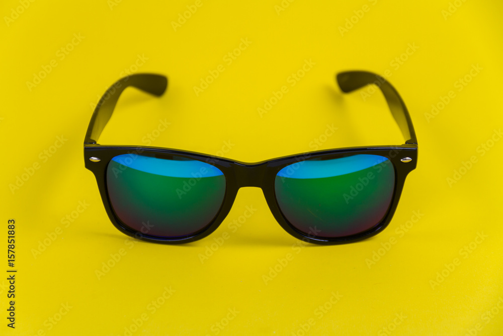 Sunglasses on Yellow background Sunglasses on Yellow background