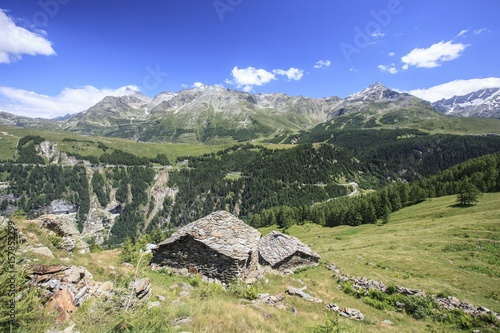 Tipical huts of a mountain pastures in Val Febbraro. Vallespluga, Valchiavenna,Valtellina Lombardy Italy Europe photo