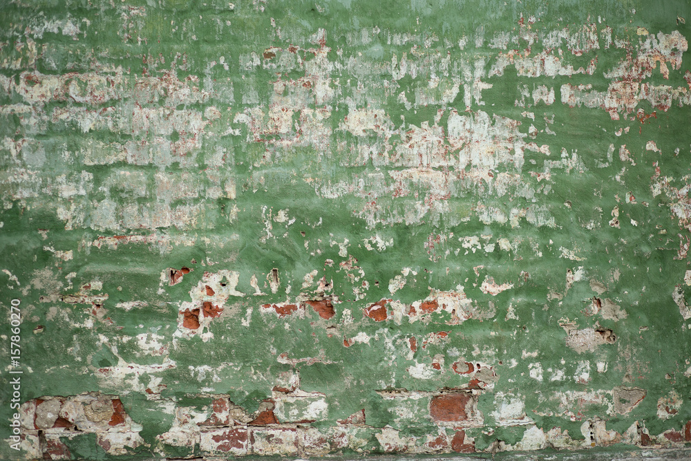 Fototapeta premium brick wall, painted with green paint, background, texture