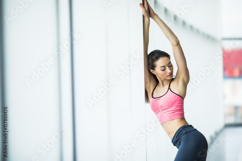 beautiful girl standing in the gym at the window and possing © F8  \ Suport Ukraine