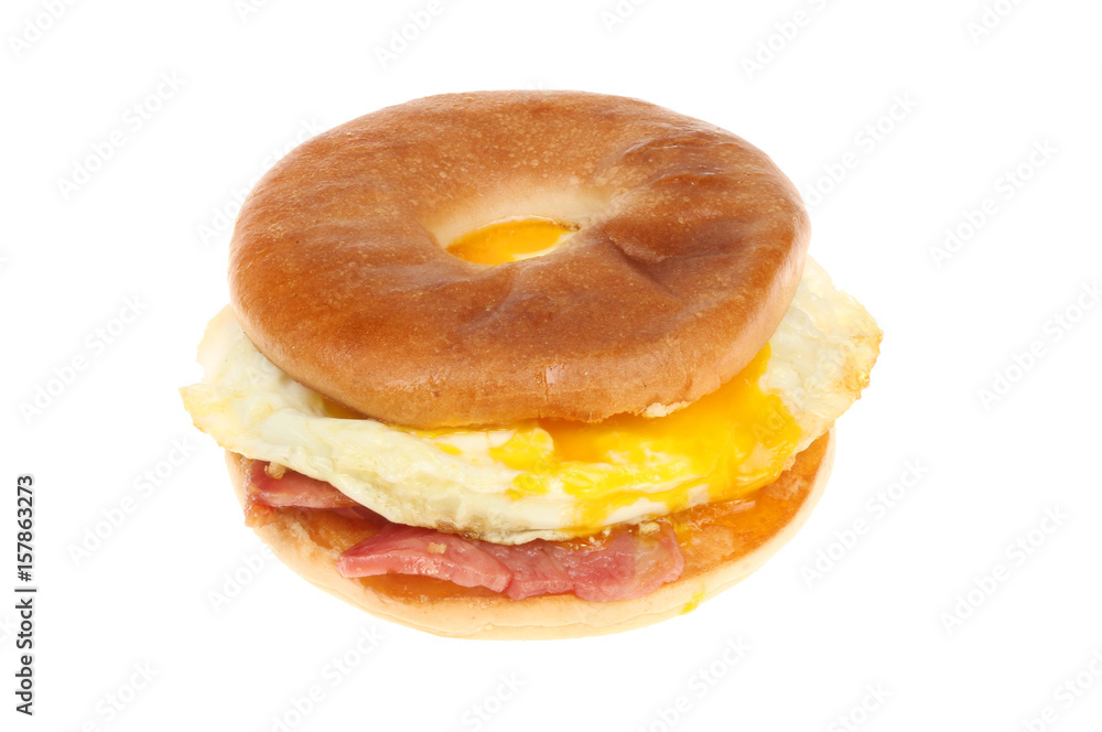 Bacon and fried egg in a toasted bagel Bacon and fried egg in a toasted bagel