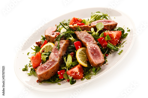 Beef with vegetables on white background