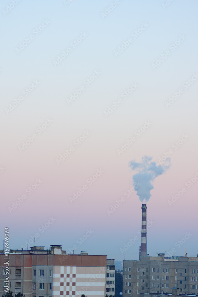 Fuming chimney over factory Fuming chimney over factory