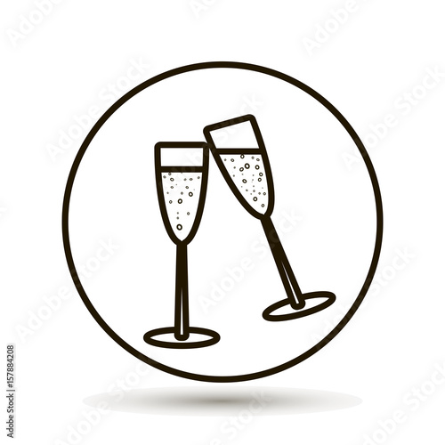 A pair of glass goblets. Champagne in a glass on white background