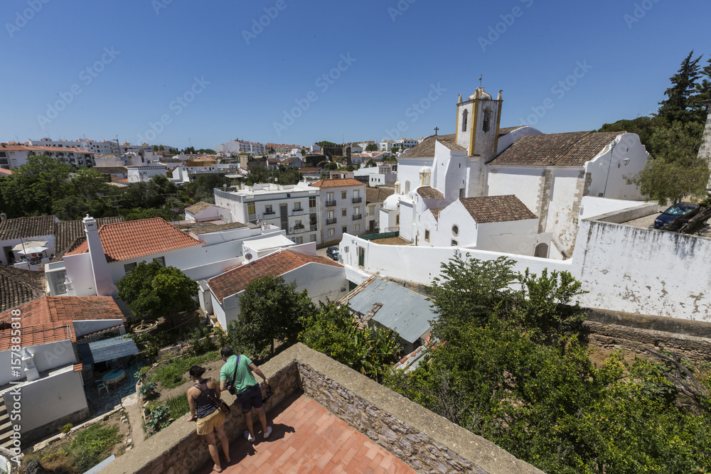 The historic church of Santiago view from a terrace in the village of Tavira Faro Algarve Portugal Europe