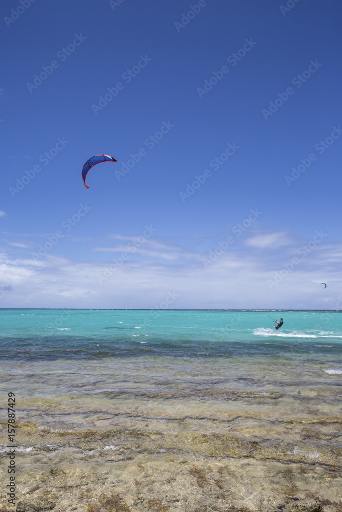 Kitesurfing in the calm and turquoise waters of the Caribbean Sea Green Island Antigua and Barbuda Leeward Island West Indies Kitesurfing in the calm and turquoise waters of the Caribbean Sea Green Island Antigua and Barbuda Leeward Island West Indies