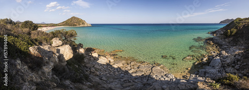Panoramic view of the turquoise sea and sandy beach surrounding Cala Monte Turno Castiadas Cagliari Sardinia Italy Europe