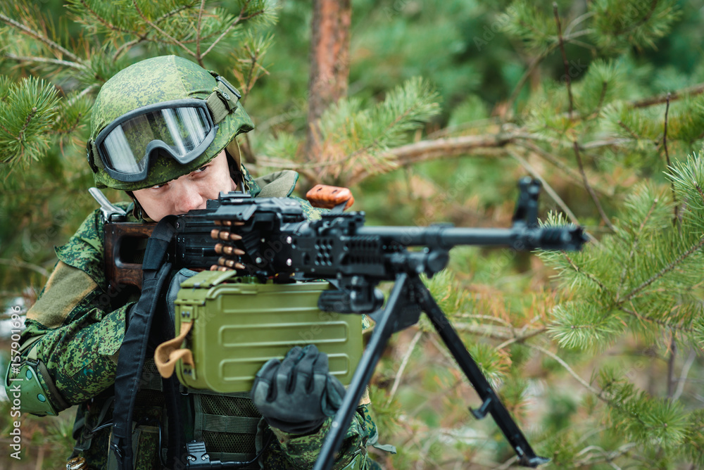 Portrait of a Russian soldier in modern military uniforms and weapons ...