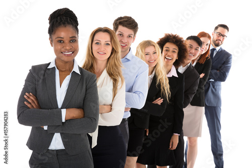 Confident Businesspeople Standing In Row
