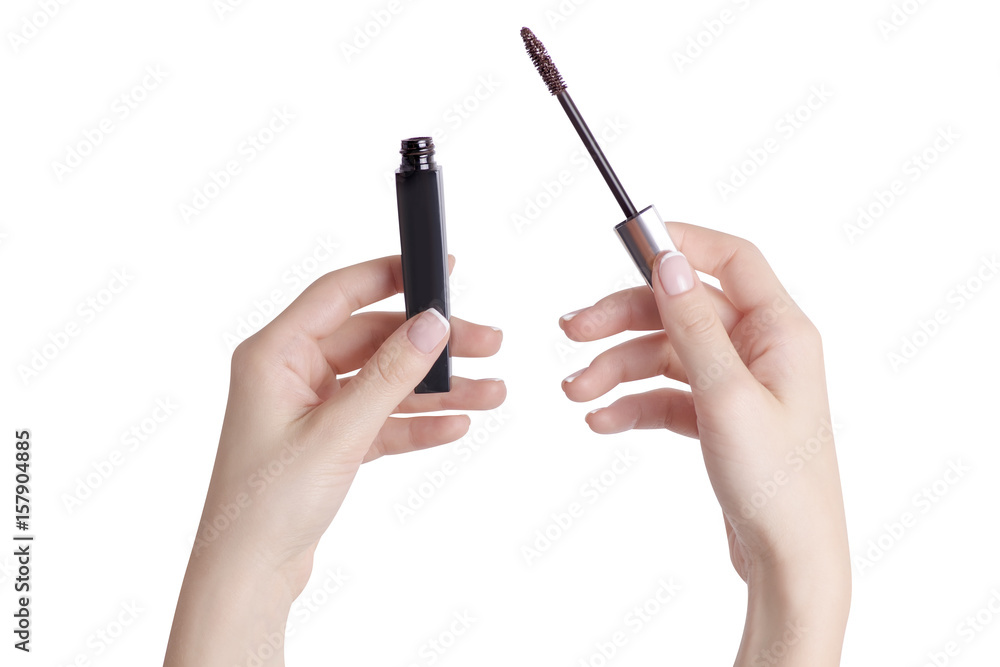 Hand with mascara for eyelashes Hand with mascara for eyelashes
