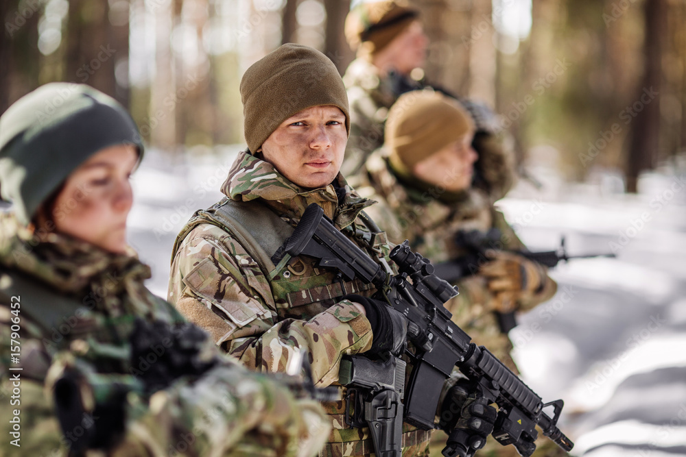 Team of airborne infantry men with weapons Team of airborne infantry men with weapons