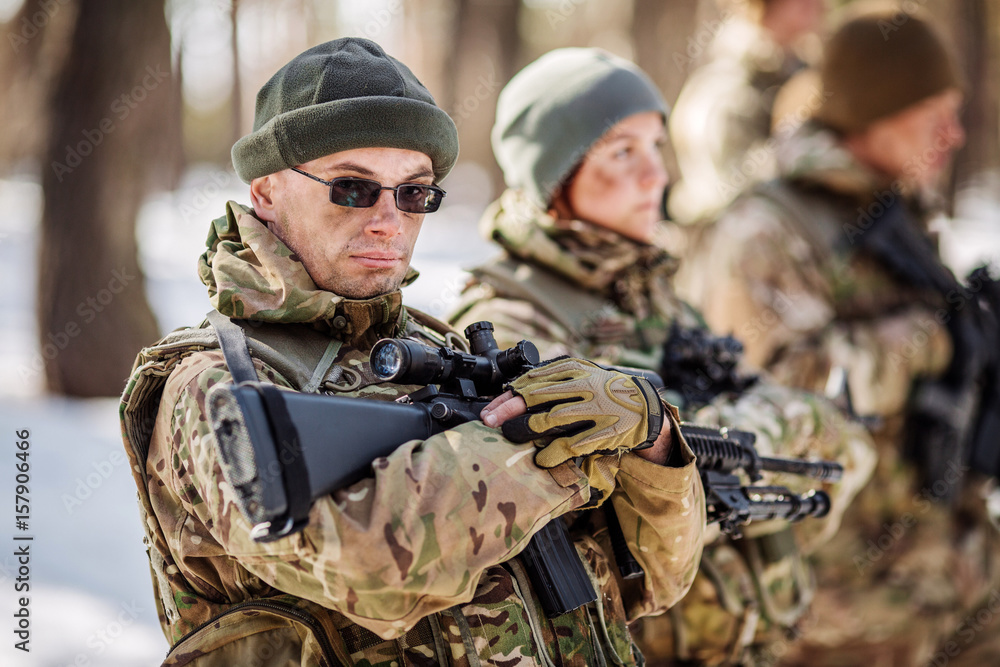 Team of airborne infantry men with weapons Team of airborne infantry men with weapons
