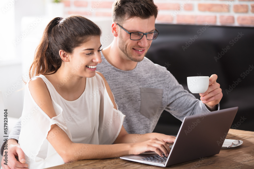 Couple Using Laptop Couple Using Laptop
