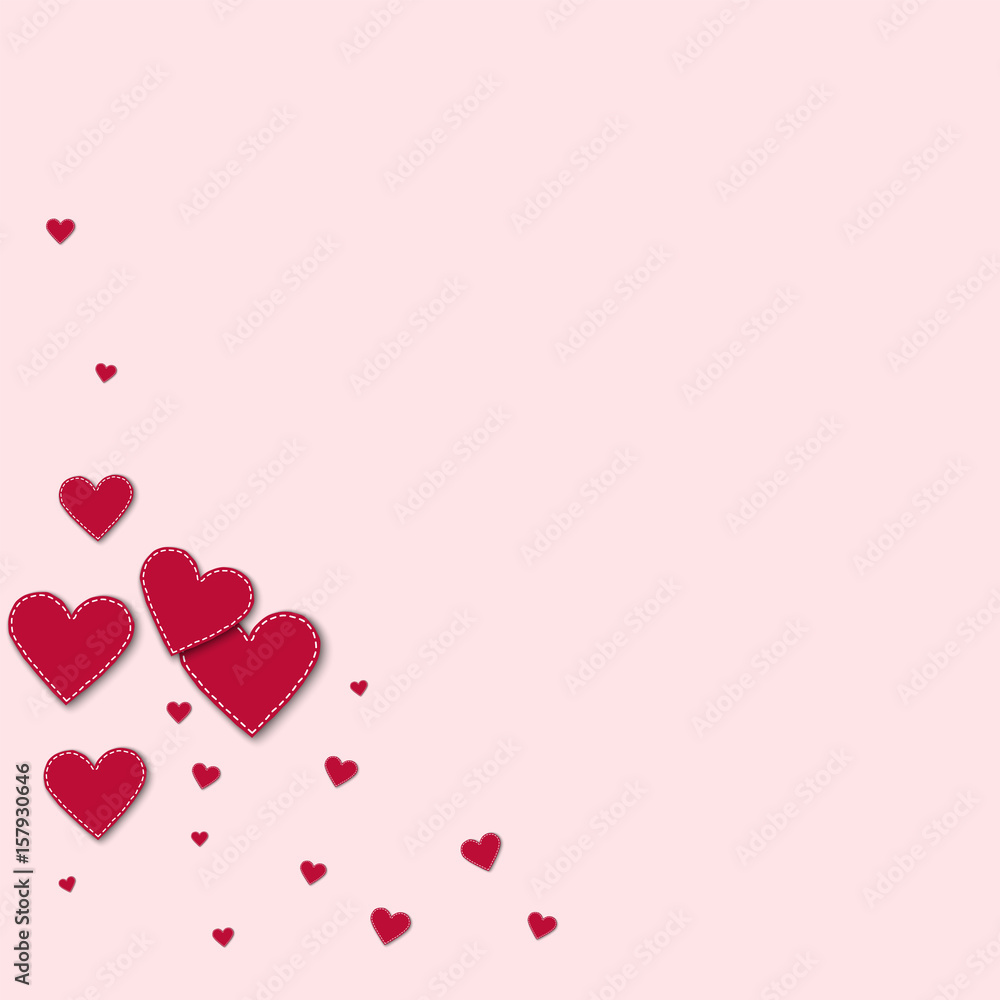 Red stitched paper hearts. Bottom left corner on light pink background. Vector illustration.