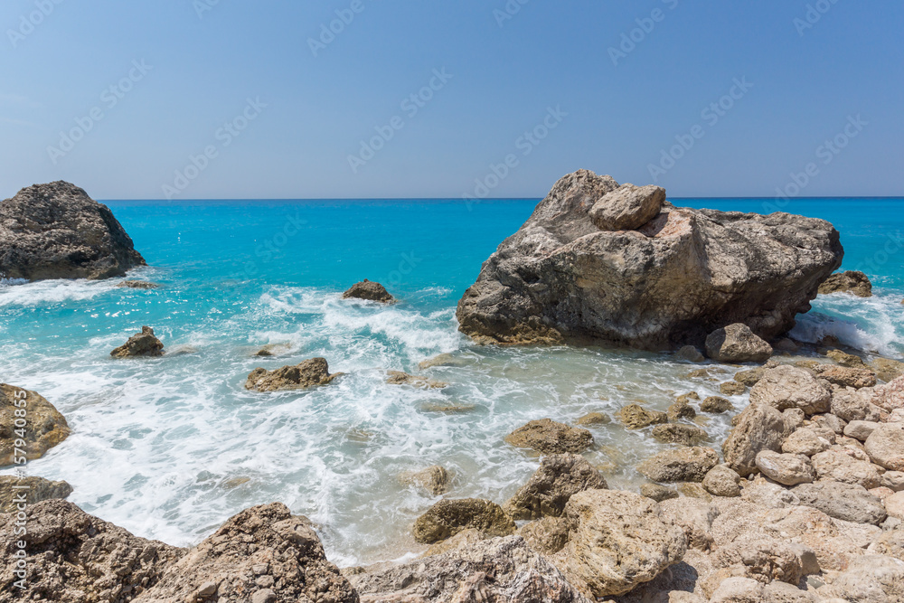 Amazing landscape of blue waters of Megali Petra Beach, Lefkada, Ionian Islands, Greece Amazing landscape of blue waters of Megali Petra Beach, Lefkada, Ionian Islands, Greece